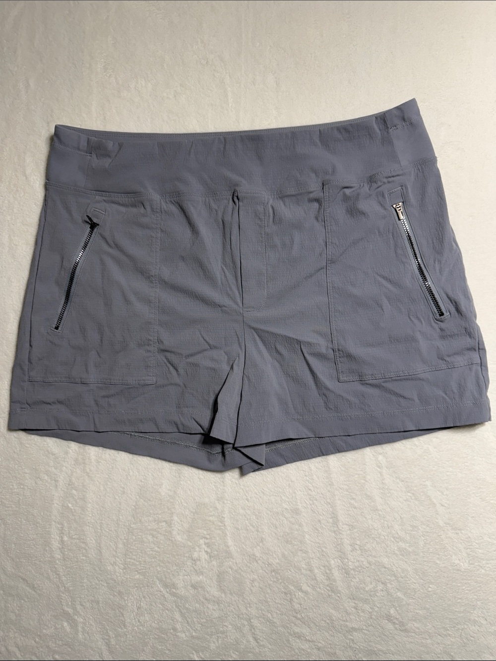 Athleta Light Gray Athletic Shorts with Zip Pockets